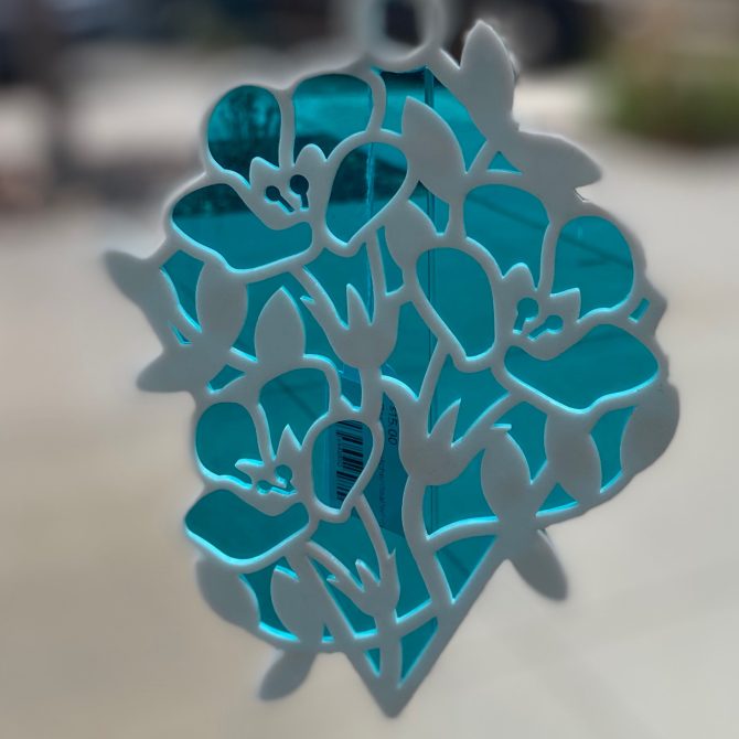 Floral sun catcher-teal/white